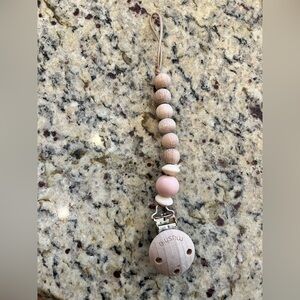 Mushie Pink Silicone & Wood Bead Pacifier Clip